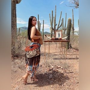 SOLD Cowhide purse✨